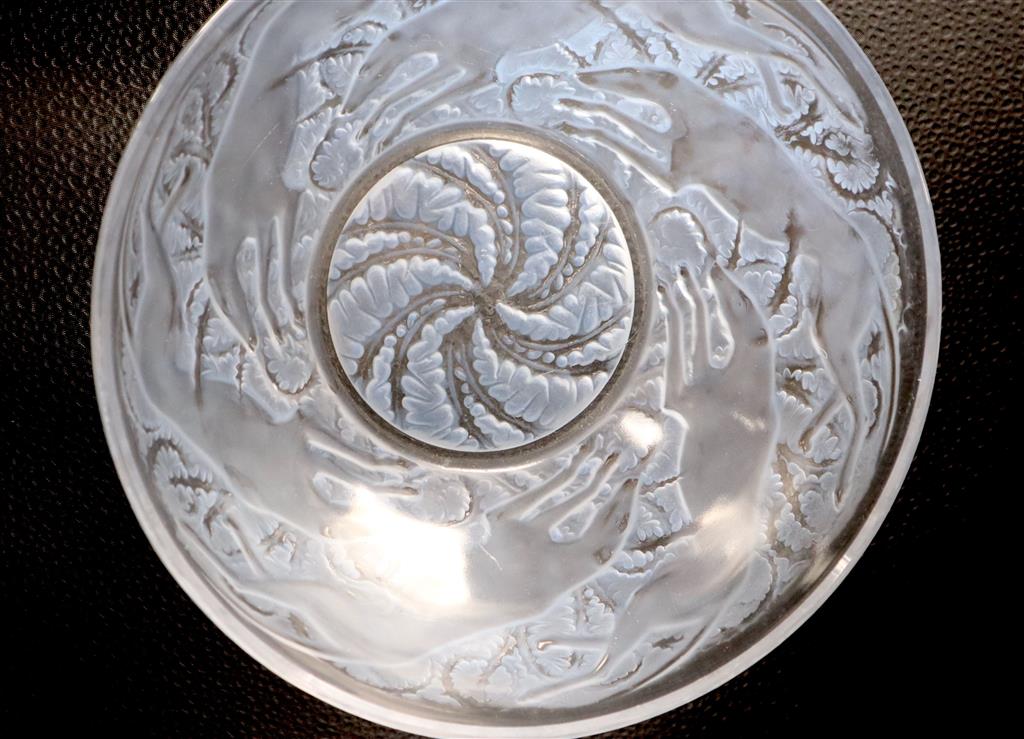 A Lalique Chiens frosted and blue stained glass bowl, moulded mark R Lalique, engraved France no. 3214 to centre, Dia 24cm